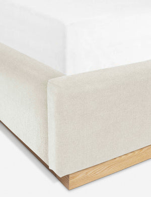 Close-up of the natural velvet fabric and the white oak base on the Lockwood Bed by Ginny Macdonald.