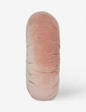 Side view of the Monroe rosewater pink velvet round pillow