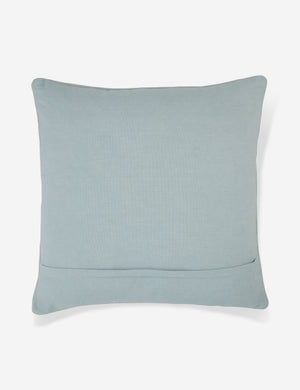 Rear view of the Ciecil sky blue throw pillow with an arabesque pattern and a woven cotton front