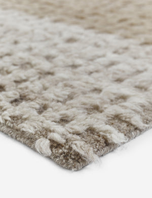 Close-up of the corner of the Terra handcrafted textured multicolored floor rug by Élan Byrd